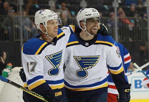 NEW YORK, NEW YORK – MARCH 29: David Perron #57 of the St. Louis Blues (r) celebrates his goal at 15:02 of the first period against the New York Rangers and is joined by Jaden Schwartz #17 (l) at Madison Square Garden on March 29, 2019 in New York City. (Photo by Bruce Bennett/Getty Images)