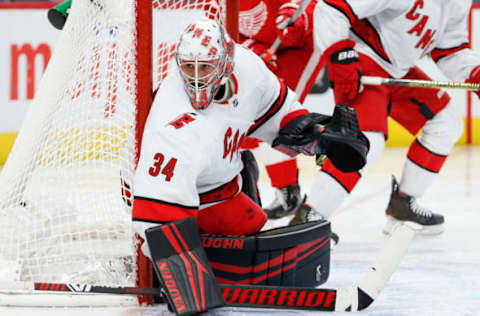 Mar 10, 2020; Detroit, Michigan, USA; Carolina Hurricanes goaltender Petr Mrazek (34) protects the net against the Detroit Red Wings during the second period at Little Caesars Arena. Mandatory Credit: Raj Mehta-USA TODAY Sports