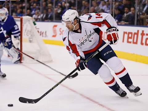 Apr 4, 2017; Toronto, Ontario, CAN; Washington Capitals forward Justin Williams (14) carries the puck against the Toronto Maple Leafs at the Air Canada Centre. Washington defeated Toronto 4-1. Mandatory Credit: John E. Sokolowski-USA TODAY Sports