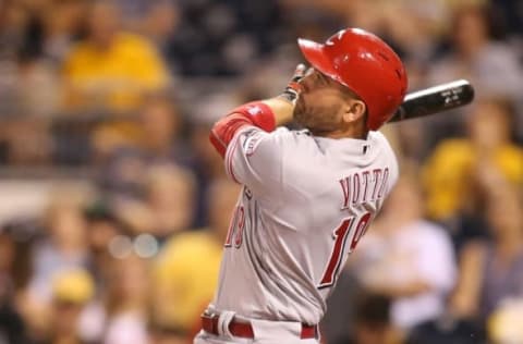 Sep 10, 2016; Pittsburgh, PA, USA; Cincinnati Reds first baseman Joey Votto (19) hits a solo home run against the Pittsburgh Pirates during the ninth inning at PNC Park. The Reds won 8-7. Mandatory Credit: Charles LeClaire-USA TODAY Sports. MLB.