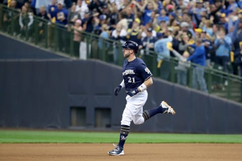 MILWAUKEE, WI – OCTOBER 13: Travvis Shaw #21 of the Milwaukee Brewers celebrates after hitting a solo home run against Alex Woood #57 of the Los Angeles Dodgers during the sixth inning in Game Two of the National League Championship Series at Miller Park on October 13, 2018 in Milwaukee, Wisconsin. (Photo by Rob Carr/Getty Images)