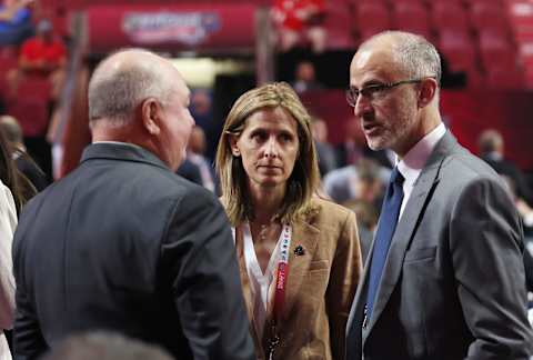 MONTREAL, QUEBEC – JULY 08: (L-R) Bruce Boudreau and Cammi Granato of the Vancouver Canuks speak with Don Granato of the Buffalo Sabres at the 2022 NHL Draft at the Bell Centre on July 08, 2022 in Montreal, Quebec. (Photo by Bruce Bennett/Getty Images)