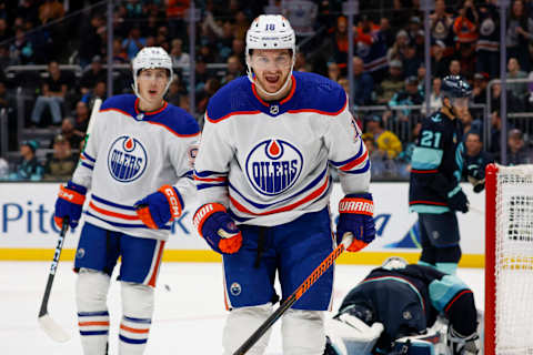 Nov 11, 2023; Seattle, Washington, USA; Edmonton Oilers left wing Zach Hyman (18) celebrates after scoring his second goal of the first period against the Seattle Kraken at Climate Pledge Arena. Mandatory Credit: Joe Nicholson-USA TODAY Sports