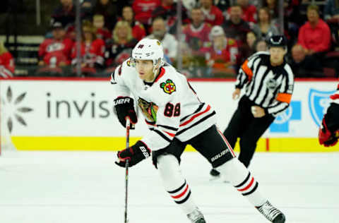 RALEIGH, NC – OCTOBER 26: Patrick Kane #88 of the Chicago Blackhawks skates with the puck during an NHL game against the Carolina Hurricanes on October 26, 2019 at PNC Arena in Raleigh North Carolina. (Photo by Gregg Forwerck/NHLI via Getty Images)