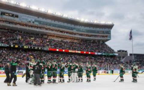 Feb 21, 2016; Minneapolis, MN, USA; The Minnesota Wild celebrate following a Stadium Series hockey game against the Chicago Blackhawks at TCF Bank Stadium. The Wild defeated the Blackhawks 6-1. Mandatory Credit: Brace Hemmelgarn-USA TODAY Sports