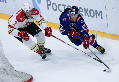 SAINT PETERSBURG, RUSSIA – 2018/01/09: Roman Graborenko (L) of HC Kunlun Red Star and Yegor Rykov of HC SKA Saint Petersburg in action during the 2017/18 Kontinental Hockey League Regular Season match between HC Kunlun Red Star and HC SKA Saint Petersburg at Ice Palace on January 09, 2018 in St. Petersburg, Russia. (Photo by Igor Russak/SOPA Images/LightRocket via Getty Images)