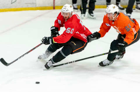 ANAHEIM, CA – SEPTEMBER 06: Left center Benoit-Olivier Groulx #50 and right winger Kiefer Sherwood #64 of the Anaheim Ducks race for the puck during the Anaheim Ducks Rookie Camp at Anaheim ICE in Anaheim on Thursday, September 6, 2018. (Photo by Leonard Ortiz/Digital First Media/Orange County Register via Getty Images)