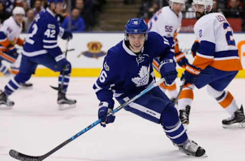 Feb 14, 2017; Toronto, Ontario, CAN; Toronto Maple Leafs forward Mitchell Marner (16) skates on the ice against the New York Islanders during the second period at the Air Canada Centre. Mandatory Credit: John E. Sokolowski-USA TODAY Sports