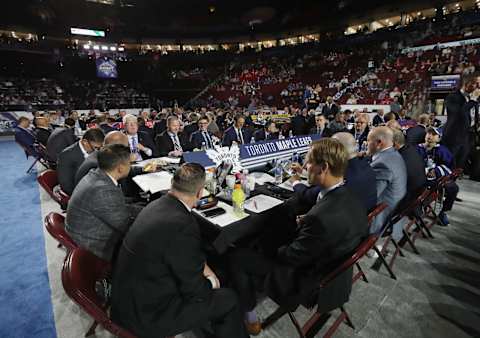 The Toronto Maple Leafs management attend the NHL Entry Draft (Photo by Bruce Bennett/Getty Images)