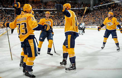 NASHVILLE, TN – OCTOBER 23: Viktor Arvidsson #33 celebrates his goal with Filip Forsberg #9 and Mattias Ekholm #14 of the Nashville Predators against the San Jose Sharks at Bridgestone Arena on October 23, 2018 in Nashville, Tennessee. (Photo by John Russell/NHLI via Getty Images)