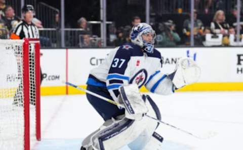 LAS VEGAS, NEVADA – APRIL 20: Connor Hellebuyck #37 of the Winnipeg Jets tends net during the second period against the Vegas Golden Knights in Game Two of the First Round of the 2023 Stanley Cup Playoffs at T-Mobile Arena on April 20, 2023 in Las Vegas, Nevada. (Photo by Chris Unger/Getty Images)