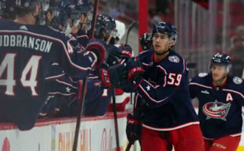 Oct 3, 2022; Raleigh, North Carolina, USA; Columbus Blue Jackets right wing Yegor Chinakhov (59) celebrates his goal against the Carolina Hurricanes during the first period at PNC Arena. Mandatory Credit: James Guillory-USA TODAY Sports