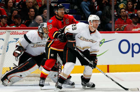 CALGARY, CANADA – JANUARY 12: Jarome Iginla #12 of the Calgary Flames skates against Francois Beauchemin #23. (Photo by Gerry Thomas/NHLI via Getty Images)