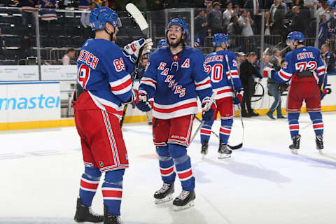 NEW YORK, NY – OCTOBER 11: Mika Zibanejad #93 and Pavel Buchnevich #89 of the New York Rangers celebrate after defeating the San Jose Sharks 3-2 in overtime at Madison Square Garden on October 11, 2018 in New York City. (Photo by Jared Silber/NHLI via Getty Images)