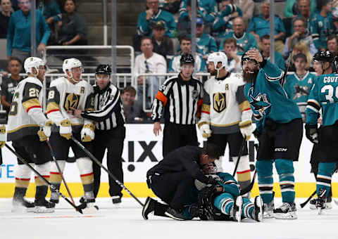 Joe Pavelski #8 of the San Jose Sharks is looked on after a hard hit by the Vegas Golden Knights. (Photo by Ezra Shaw/Getty Images)