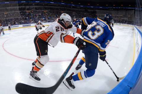 ST. LOUIS, MO – OCTOBER 14: Brandon Montour #26 of the Anaheim Ducks checks Jordan Kyrou #33 of the St. Louis Blues at Enterprise Center on October 14, 2018, in St. Louis, Missouri. (Photo by Joe Puetz/NHLI via Getty Images)