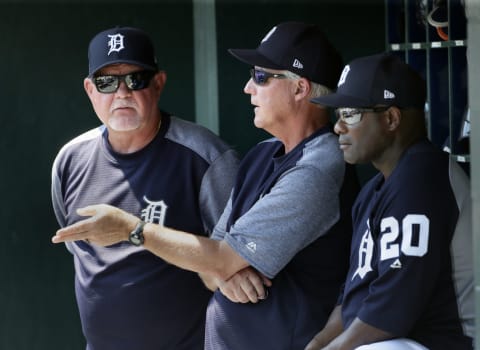 DETROIT, MI – JUNE 28: Pitching coach Ricck Anderson #4 of the Detroit Tigers, center, talks with manager Ron Gardennhire #15 of the Detroit Tigers and hitting coach Lloyd McClenndon #20 of the Detroit Tigers during the eighth inning of a game against the Detroit Tigers at Comerica Park on June 28, 2018 in Detroit, Michigan. The Athletics defeated the Tigers 4-2. (Photo by Duane Burleson/Getty Images)