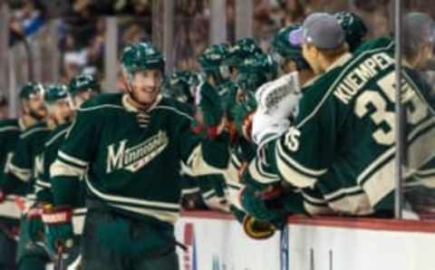 Oct 30, 2015; Saint Paul, MN, USA; Minnesota Wild forward Ryan Carter (18) celebrates his goal with teammates during the first period against the Chicago Blackhawks at Xcel Energy Center. Mandatory Credit: Brace Hemmelgarn-USA TODAY Sports