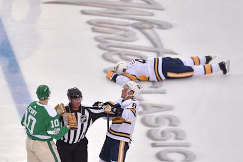 Nashville Predators defenseman Ryan Ellis (4) lays on the ice after being injured by Dallas Stars right wing Corey Perry Mandatory Credit: Tim Flores-USA TODAY Sports