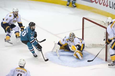 May 7, 2016; San Jose, CA, USA; San Jose Sharks right wing Melker Karlsson (68) scores a goal against Nashville Predators goalie Carter Hutton (30) during the third period in game five of the second round of the 2016 Stanley Cup Playoffs at SAP Center at San Jose. The Sharks defeated the Predators 5-1. Mandatory Credit: Kyle Terada-USA TODAY Sports