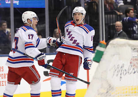 TORONTO, ON- DECEMBER 28 – New York Rangers center Ryan Strome (16) celebrates with New York Rangers right wing Jesper Fast (17) after scoring as the Toronto Maple Leafs play the New York Rangers at Rogers Centre in Toronto. December 28, 2019. (Steve Russell/Toronto Star via Getty Images)