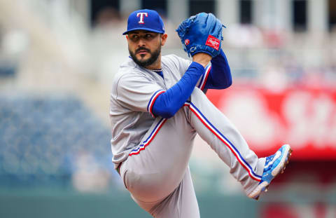 Apr 19, 2023; Kansas City, Missouri, USA; Texas Rangers starting pitcher Martin Perez (54) warms up during the first inning against the Kansas City Royals at Kauffman Stadium. Mandatory Credit: Jay Biggerstaff-USA TODAY Sports