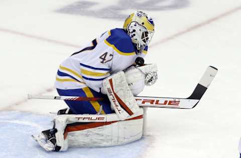 Dec 17, 2021; Pittsburgh, Pennsylvania, USA; Buffalo Sabres goaltender Malcolm Subban (47) makes a save against the Pittsburgh Penguins during the second period at PPG Paints Arena. Mandatory Credit: Charles LeClaire-USA TODAY Sports