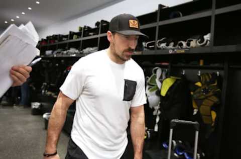 BOSTON – MAY 9: Boston Bruins’ Brad Marchand walks through a locker room as Bruins players give end-of-season interviews at their practice facility in the Brighton neighborhood of Boston on May 9, 2018. (Photo by Pat Greenhouse/The Boston Globe via Getty Images)