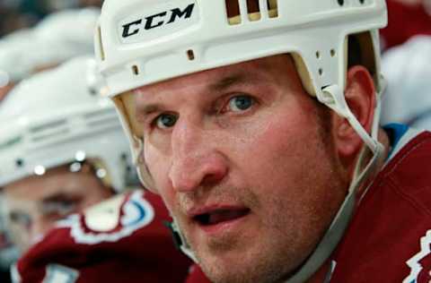 VANCOUVER, CANADA – MARCH 16: Adam Foote #52 of the Colorado Avalanche looks on from the bench during the game against the Vancouver Canucks at Rogers Arena on March 16, 2011 in Vancouver, British Columbia, Canada. Vancouver won 4-2. (Photo by Jeff Vinnick/NHLI via Getty Images)