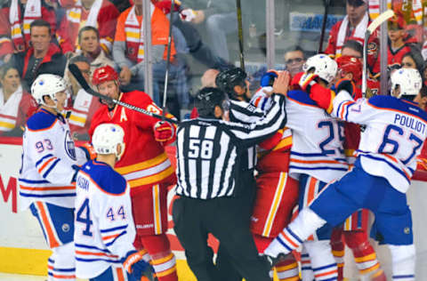 14 October 2016: Calgary Flames Left Wing Matthew Tkachuk (19) and Edmonton Oilers Defenceman Darnell Nurse (25) gets in a fight during an NHL Hockey game between the Calgary Flames and the Edmonton Oilers at the Scotiabank Saddledome in Calgary, AB. (Photo by Jose Quiroz/Icon Sportswire via Getty Images)