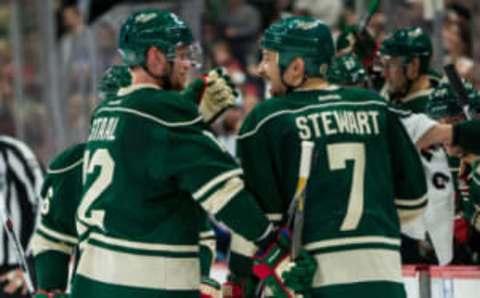 Oct 15, 2016; Saint Paul, MN, USA; Minnesota Wild forward Eric Staal (12) celebrates with forward Chris Stewart (7) following his goal during the second period against the Winnipeg Jets at Xcel Energy Center. Mandatory Credit: Brace Hemmelgarn-USA TODAY Sports