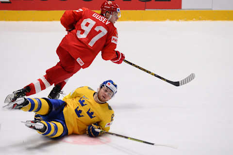 Sweden’s forward William Nylander (front) and Russia’s forward Nikita Gusev vie during the IIHF Men’s Ice Hockey World Championships Group B match between Sweden and Russia on May 21, 2019 in Bratislava, Slovakia. (Photo by VLADIMIR SIMICEK / AFP) (Photo credit should read VLADIMIR SIMICEK/AFP/Getty Images)