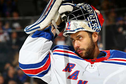 NEW YORK, NY – APRIL 05: Ondrej Pavelec #31 of the New York Rangers dons his mask during a game against the New York Islanders at Barclays Center on April 5, 2018 in New York City. (Photo by Mike Stobe/NHLI via Getty Images)