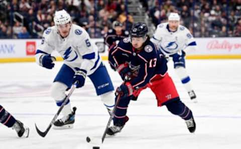 COLUMBUS, OHIO – OCTOBER 14: Johnny Gaudreau #13 of the Columbus Blue Jackets controls the puck against Philippe Myers #5 of the Tampa Bay Lightning during the second period at Nationwide Arena on October 14, 2022 in Columbus, Ohio. (Photo by Emilee Chinn/Getty Images)