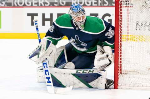 VANCOUVER, BC – FEBRUARY 19: Goalie Thatcher Demko #35 of the Vancouver Canucks readies to make a save during NHL hockey action against the Winnipeg Jets at Rogers Arena on February 19, 2021 in Vancouver, Canada. (Photo by Rich Lam/Getty Images)