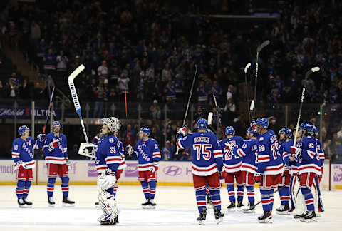 The New York Rangers celebrate a win (Photo by Elsa/Getty Images)