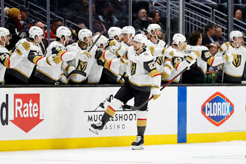 SEATTLE, WASHINGTON – MARCH 30: Shea Theodore #27 of the Vegas Golden Knights celebrates his goal with teammates on the bench during the second period against the Seattle Kraken at Climate Pledge Arena on March 30, 2022 in Seattle, Washington. (Photo by Steph Chambers/Getty Images)