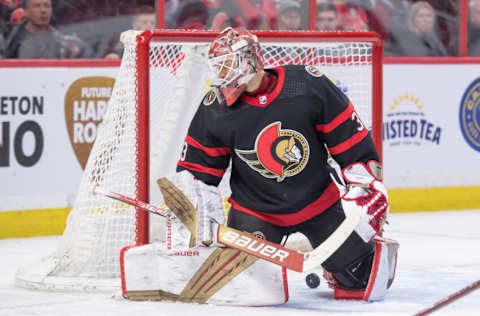 Feb 27, 2023; Ottawa, Ontario, CAN; The Detroit Red Wings score against Ottawa Senators goalie Cam Talbot (33) in the second period at the Canadian Tire Centre. Mandatory Credit: Marc DesRosiers-USA TODAY Sports