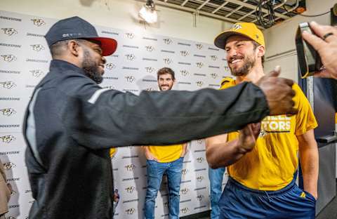 NASHVILLE, TN – DECEMBER 7: Roman Josi #59 of the Nashville Predators greets former teammate P.K. Subban #76 of the New Jersey Devils for Blueline Buddies prior to their game at Bridgestone Arena on December 7, 2019 in Nashville, Tennessee. (Photo by John Russell/NHLI via Getty Images)