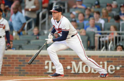 ATLANTA, GA JUNE 16: Braves first baseman Freddie Freeman (5) hits a single during the game between Atlanta and San Diego on June 16th, 2018 at SunTrust Park in Atlanta, GA. The Atlanta Braves defeated the San Diego Padres by a score of 1 0. (Photo by Rich von Biberstein/Icon Sportswire via Getty Images)