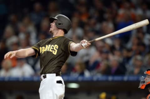 Sep 23, 2016; San Diego, CA, USA; San Diego Padres first baseman Wil Myers (4) hits a three run home run during the first inning against the San Francisco Giants at Petco Park. Mandatory Credit: Jake Roth-USA TODAY Sports