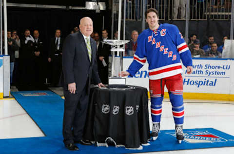 NEW YORK, NY – APRIL 09: The Presidents Trophy is presented by NHL Deputy Commissioner, Bill Daly, to Ryan McDonagh #27 of the New York Rangers prior to the game against the Ottawa Senators at Madison Square Garden on April 9, 2015 in New York City. (Photo by Jared Silber/NHLI via Getty Images)