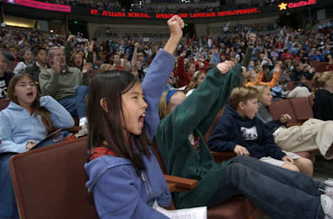 Geraldine Wilkins Arroyo elementary school fifth grader Nicole Tanaka,10 cheers for the Anaheim Ducks at the Mighty Ducks Fourth Annual First Flight Field Trip.