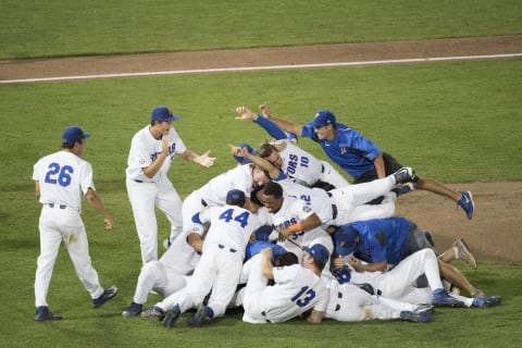 OMAHA, NE – JUNE 27: The University of Florida players run onto the field in celebration after defeating Louisiana State University 6-1 in game two of the Division I Men’s Baseball Championship held at TD Ameritrade Park on June 27, 2017, in Omaha, Nebraska. (Photo by Justin Tafoya/NCAA Photos via Getty Images)