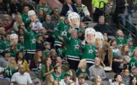 Oct 27, 2015; Dallas, TX, USA; Fans of Dallas Stars center Cody Eakin (not pictured) celebrate during the game between the Stars and the Anaheim Ducks at the American Airlines Center. The Stars defeat the Ducks 4-3. Mandatory Credit: Jerome Miron-USA TODAY Sports