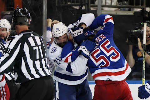 NEW YORK, NEW YORK – JUNE 09: Nicholas Paul #20 of the Tampa Bay Lightning and Ryan Lindgren #55 of the New York Rangers fight at the end of the third period in Game Five of the Eastern Conference Final of the 2022 Stanley Cup Playoffs at Madison Square Garden on June 09, 2022 in New York City. (Photo by Bruce Bennett/Getty Images)