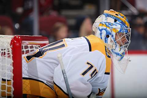 GLENDALE, ARIZONA – OCTOBER 17: Goaltender Juuse Saros #74 of the Nashville Predators looks down ice during the third period of the NHL game against the Arizona Coyotes at Gila River Arena on October 17, 2019 in Glendale, Arizona. The Coyotes defeated the Predators 5-2. (Photo by Christian Petersen/Getty Images)