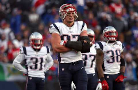 ORCHARD PARK, NY – DECEMBER 3: New England Patriots tight end Rob Gronkowski (87) stands by as he waits for the officials’ ruling after his hit on Buffalo Bills cornerback Tre’Davious White (27) during the fourth quarter. The New England Patriots take on the Buffalo Bills in a regular season NFL football game at New Era Field in Orchard Park, NY on Dec. 3, 2017. (Photo by Barry Chin/The Boston Globe via Getty Images)