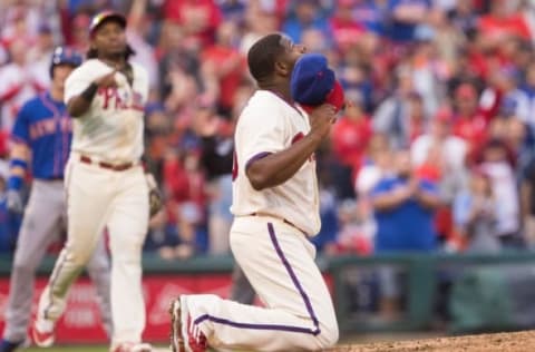 Before He Celebrates with His Friend Franco, Neris Gives Thanks for His First Save as a Closer. Photo by Bill Streicher – USA TODAY Sports.