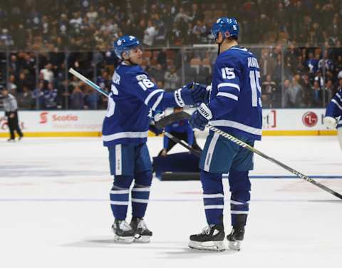 TORONTO, ON – NOVEMBER 10: Mitch Marner #16 and Matt Martin #15 of the Toronto Maple Leafs celebrate a win against the Boston Bruins at the Air Canada Centre on November 10, 2017 in Toronto, Canada. The Maple Leafs defeated the Bruins 3-2 in overtime. (Photo by Bruce Bennett/Getty Images)